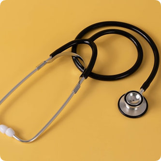 Stethoscope on yellow background